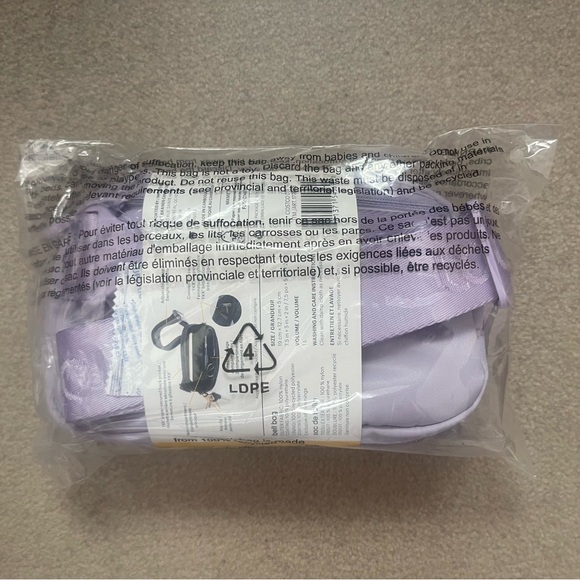 Lolë Unisex Belt Bag 1L in PURPLE - Picture 2 of 7